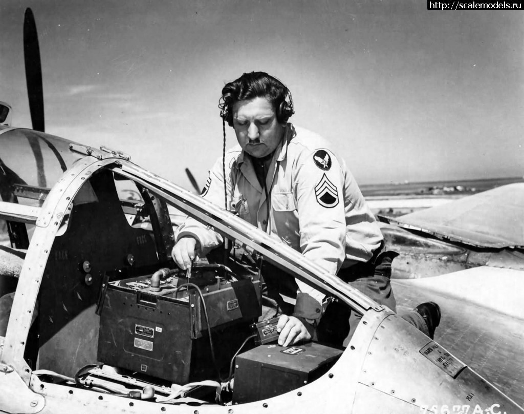 1468419753_A_Member_Of_the_94th_Fighter_Squadron_1st_Fighter_Group_Checks_Radio_Equipment_In_A_P-38_Lightning_Italy.jpg : HobbyBoss 1/48 P-38L-5-LO Lightning(#10144) -   