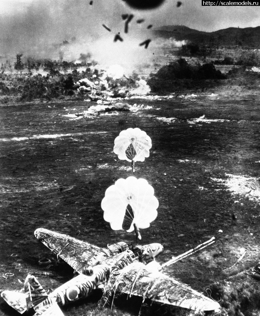 1547152620_American_Para-frag_bombs_fall_onto_Ki-21_Buru_Island_1944.jpg : #1527434/ B-24   -    